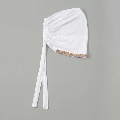 Bonnet liseré de diamants
